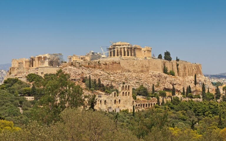 The Acropolis and the Parthenon on their rocky hill above Athens, seen from Philopappos Hill