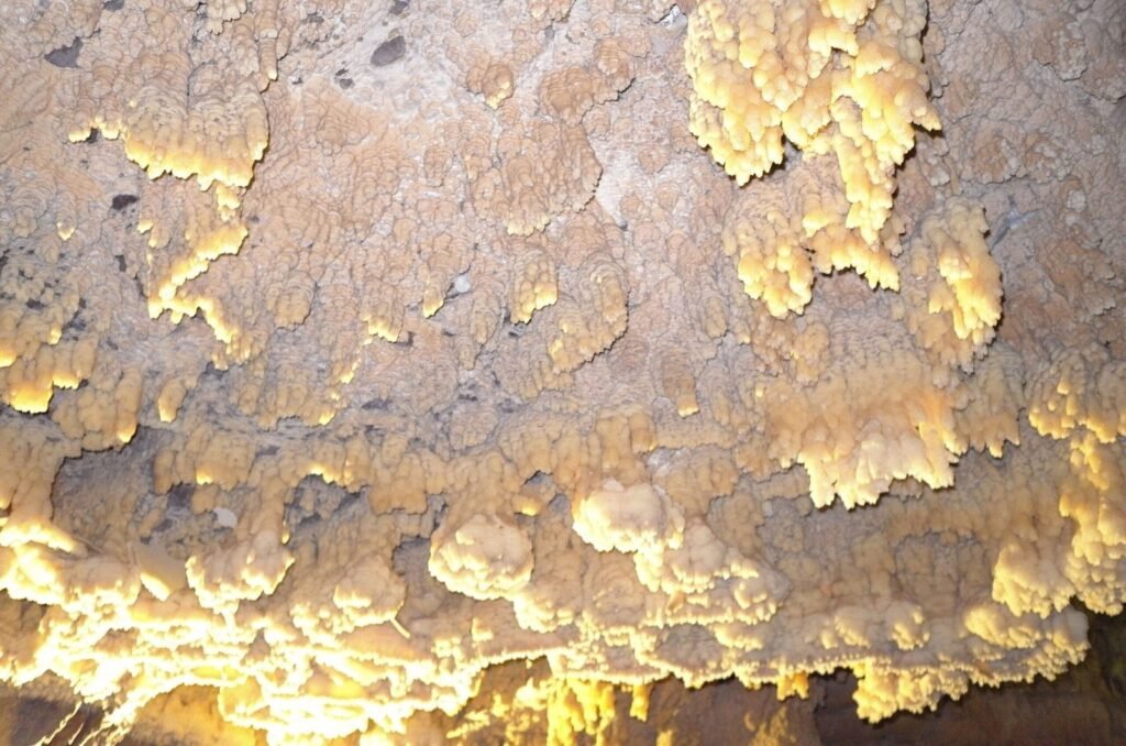 Yellow and white rock crust on the cave ceiling