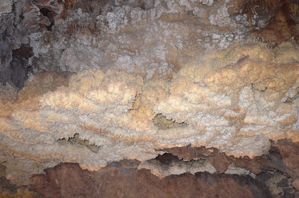White rock crust on the cave ceiling of Ali Sadr Cave