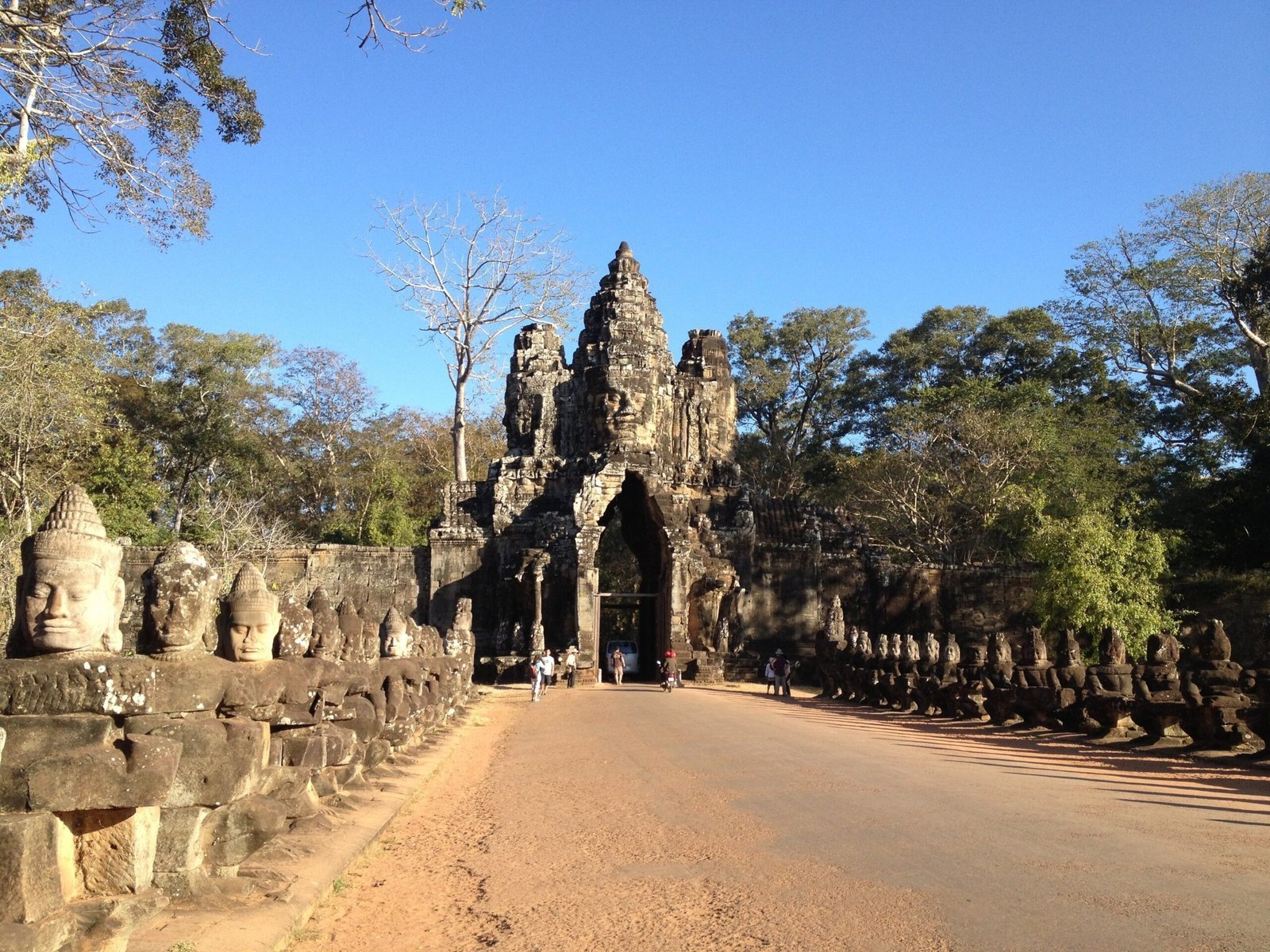 Stone figures line the causeway to the south gate of Angkor Thom near Siem Reap.