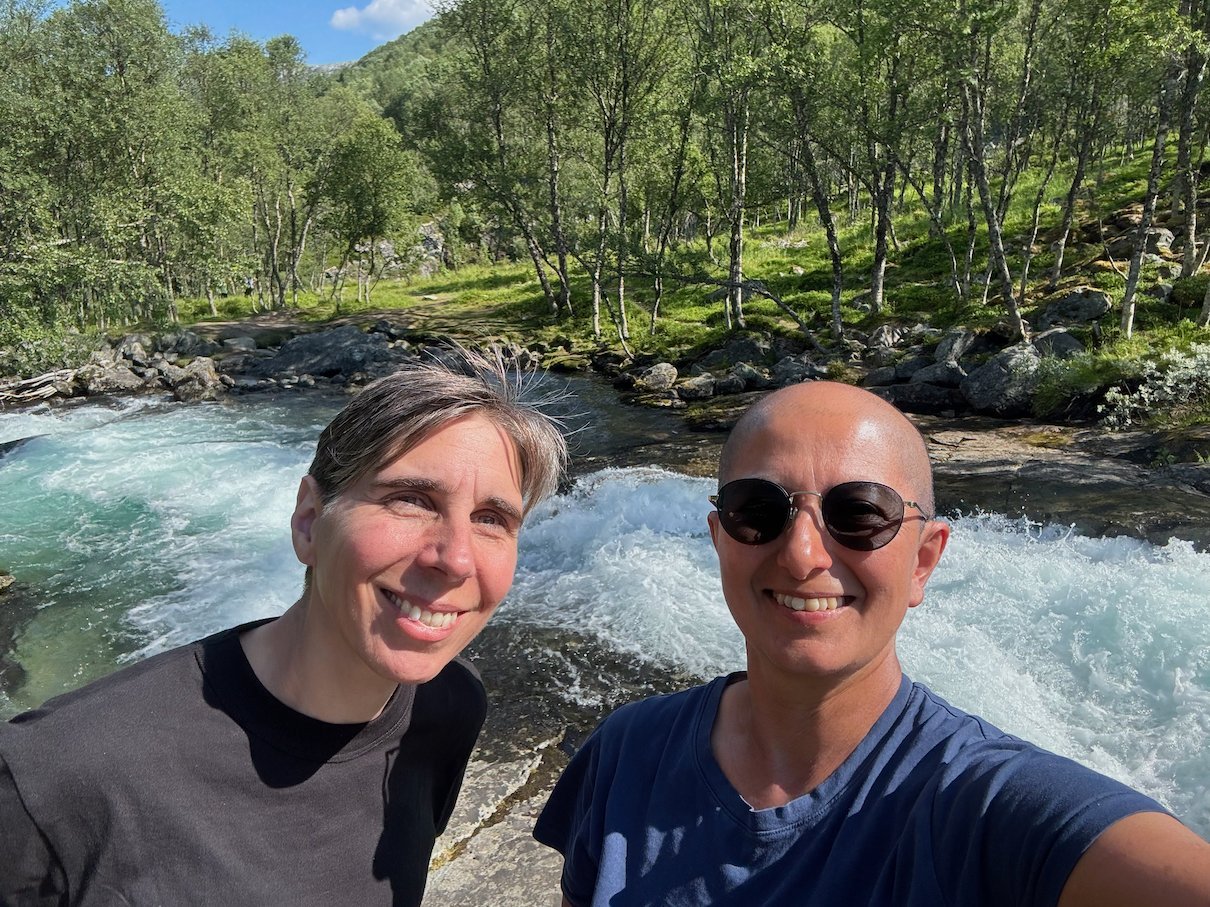 Selfie with a friend by the rushing river