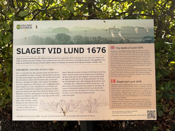 Information sign Slaget vid Lund 1676 from Kävlinge municipality, with text in Swedish, English and Danish