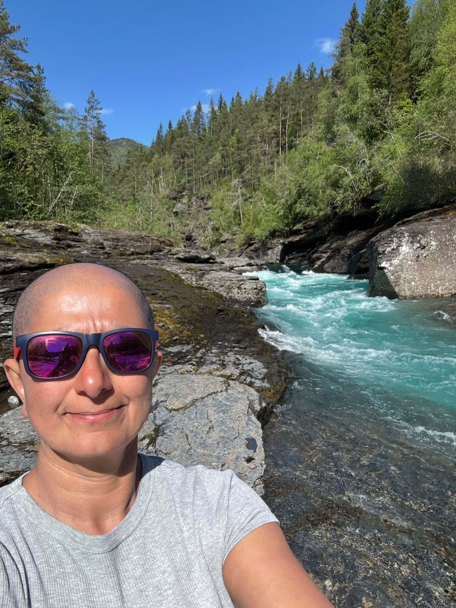 Selfie with sunglasses beside the river rapids at Bømoen