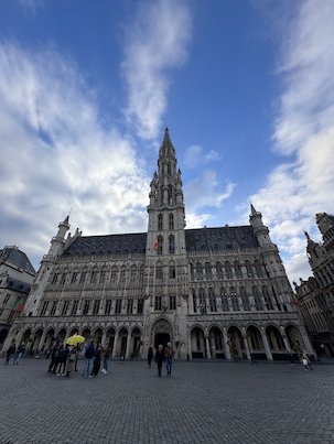 The Gothic Town Hall with its tall tower stands on the Grand-Place in Brussels.