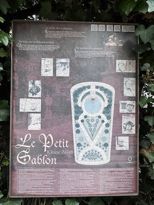 An information board shows the plan of the Petit Sablon garden in Brussels.