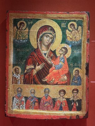 Byzantine icon of the Virgin and Child with saints in a Meteora monastery museum