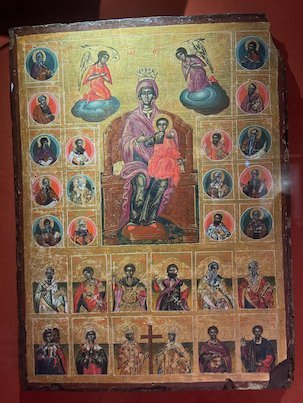 Byzantine icon of the Virgin on a throne with many saints around her, in a Meteora monastery