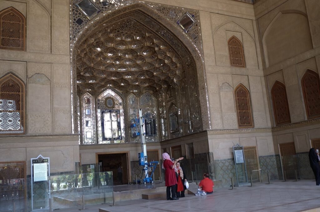 Mirror hall at the entrance of Chehel Sotoun Palace with visitors