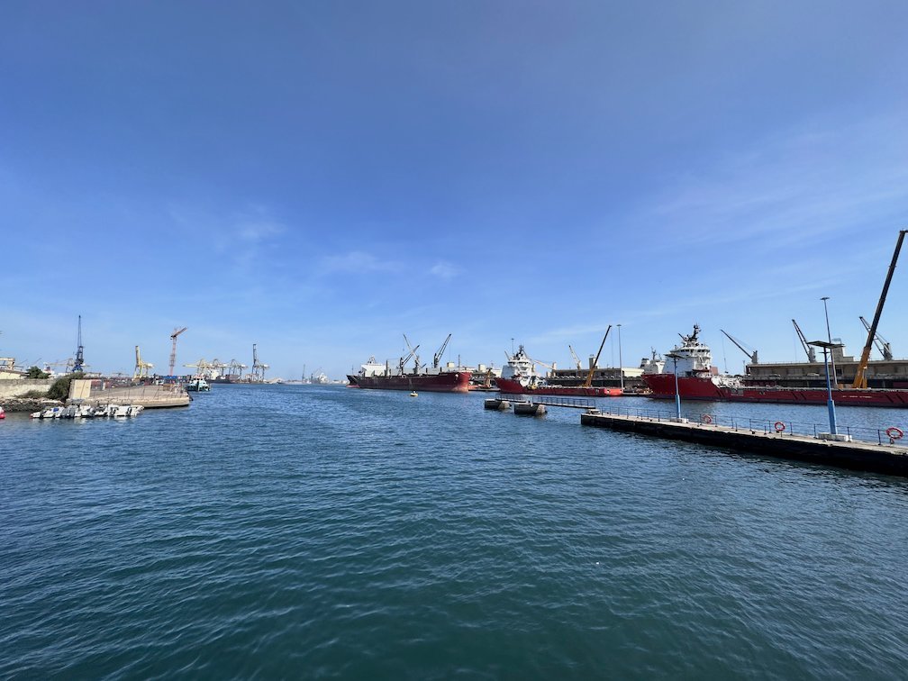 Ships lie at the quay in the port of Dakar.
