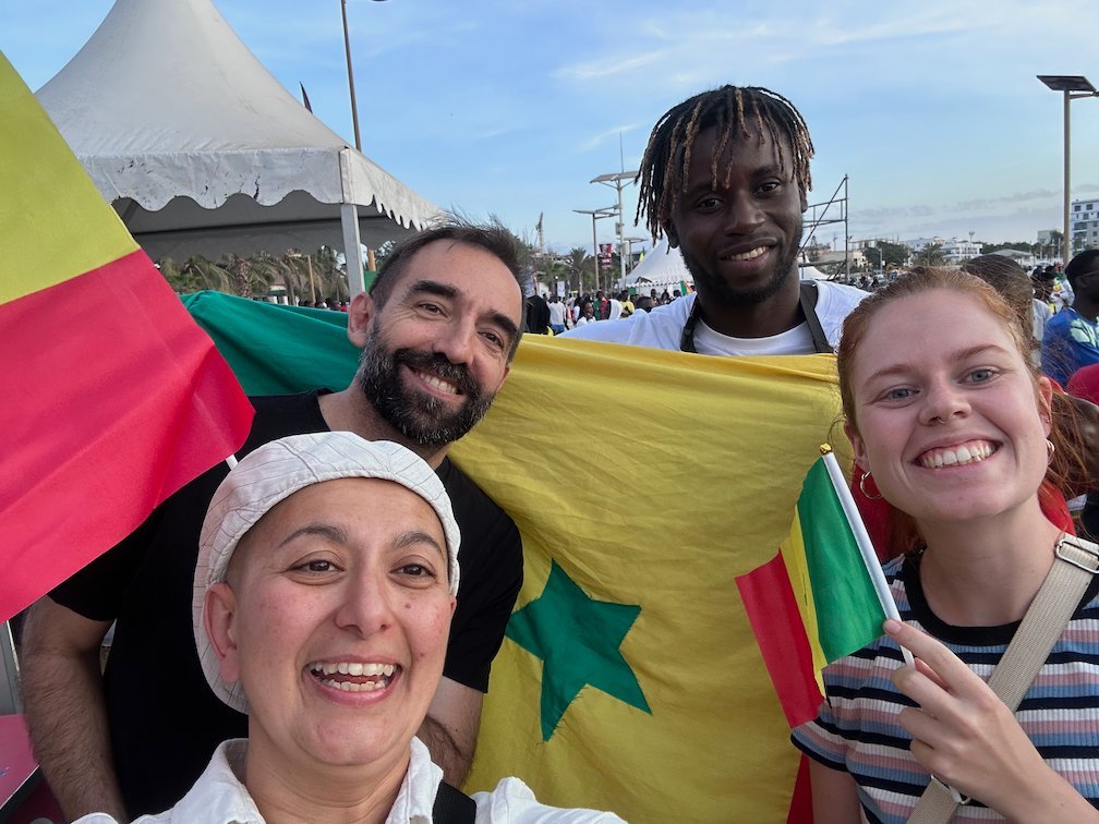 Zayera Khan takes a selfie with fans and Senegal flags during the World Cup in Dakar.