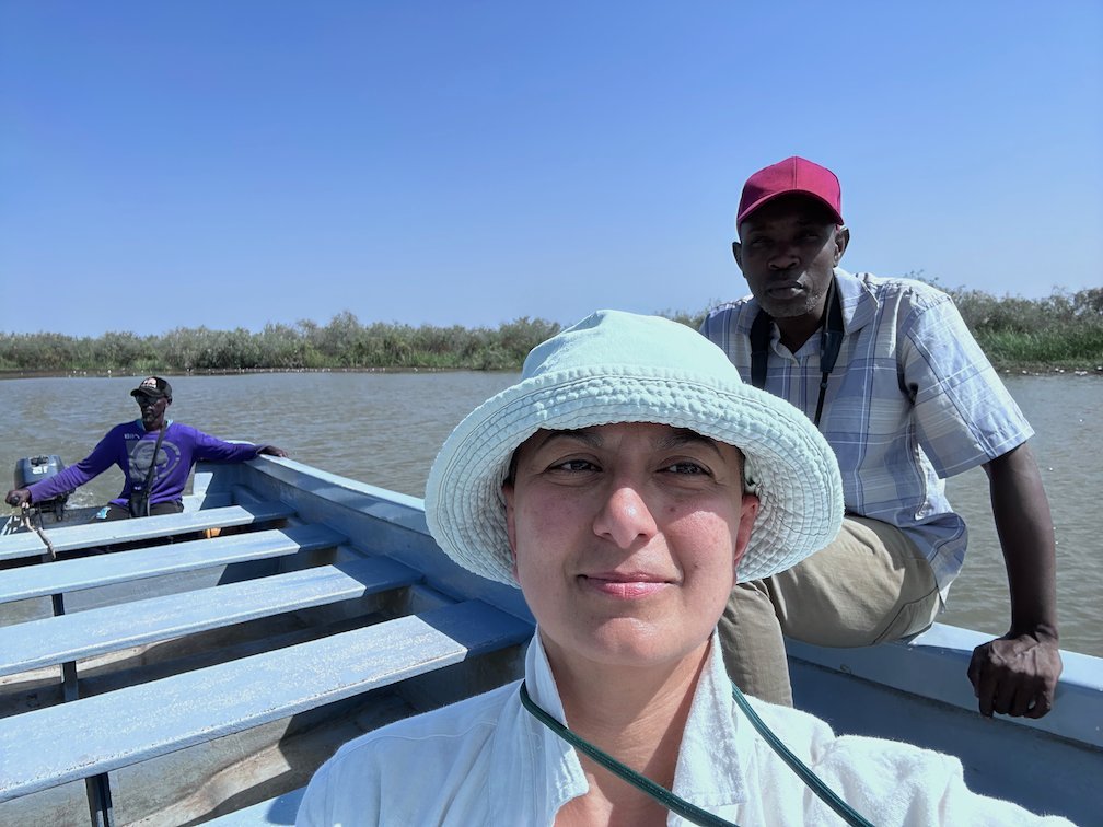 Zayera Khan takes a selfie in a boat with the guide on the lake in Djoudj.