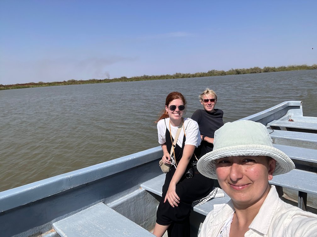 Zayera Khan takes a selfie with two travelers on a boat in Djoudj.