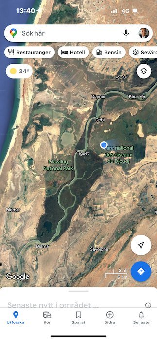 A phone map shows the lakes and channels of Djoudj National Bird Park.