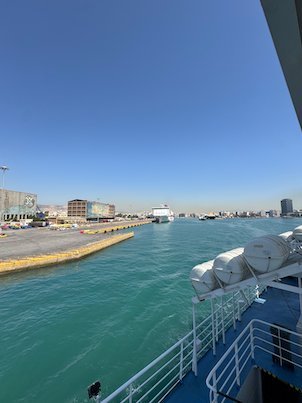 Ferry deck and green water as the ferry enters the port of Piraeus