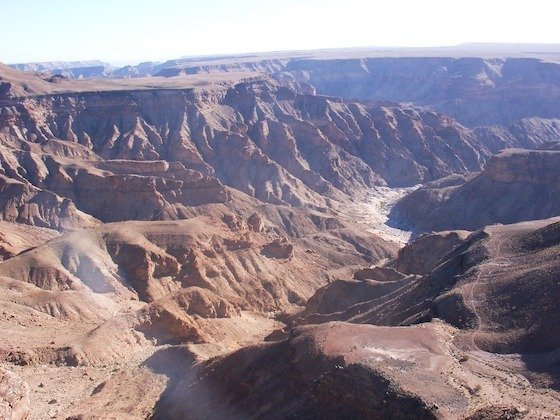 The Fish River Canyon cuts deep bends into brown rock in southern Namibia.