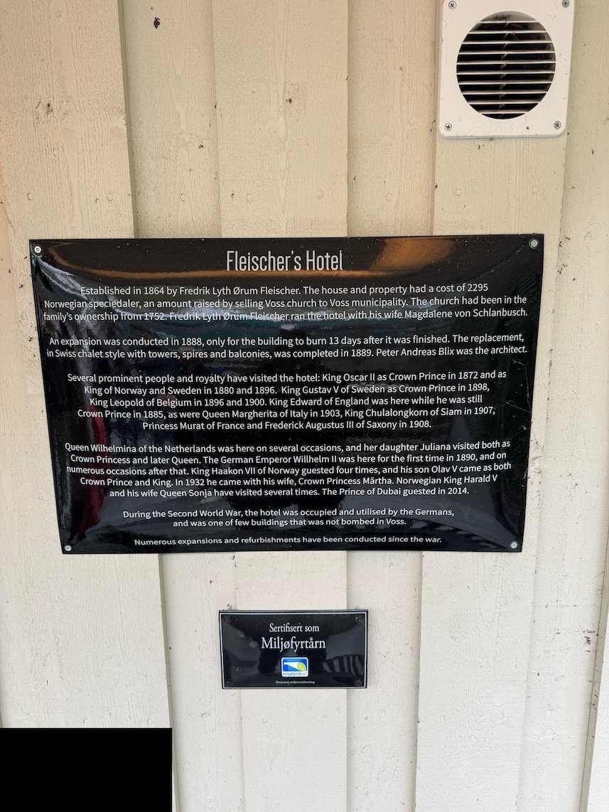 Sign about the history of Fleischer’s Hotel on a white wall