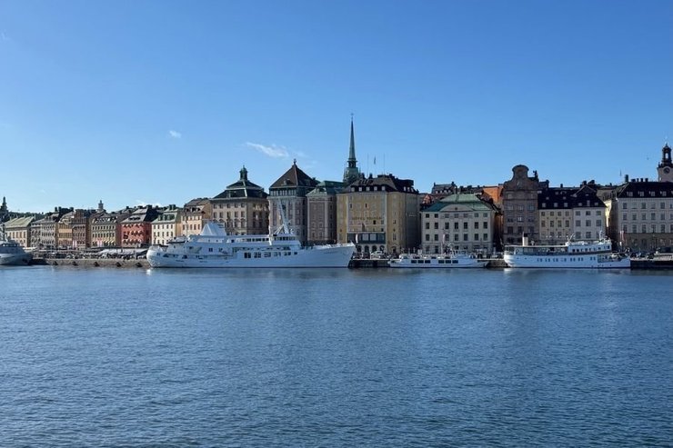 Gamla Stan's waterfront and old buildings seen across the water in autumn, Stockholm, photographed by Zayera Khan