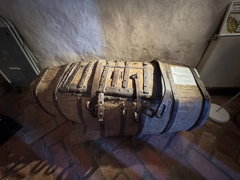 Medieval oak chest with iron bands, made from one hollow oak log