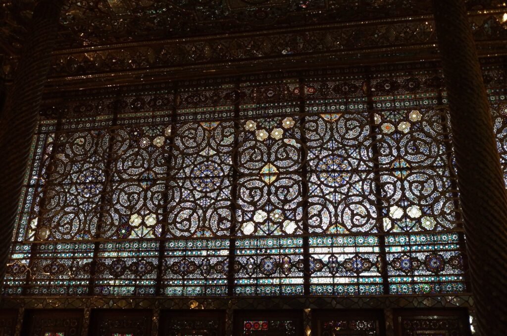 Large lattice window with colored glass at Golestan Palace
