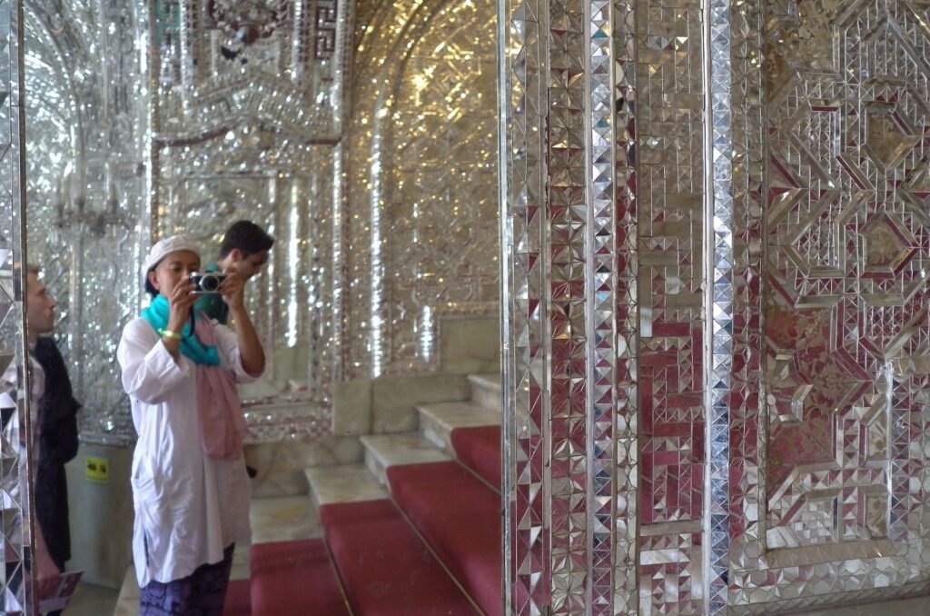Zayera Khan and another visitor reflected in the mirror hall at Golestan Palace