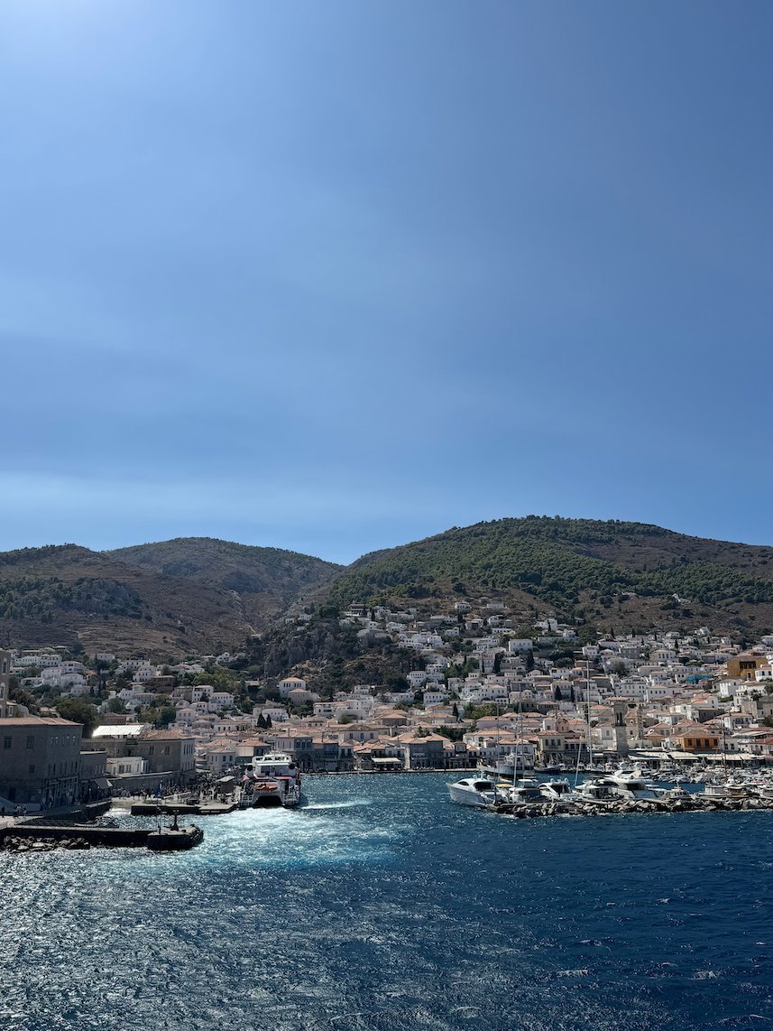 Hydra town and harbor in the blue light after sunset