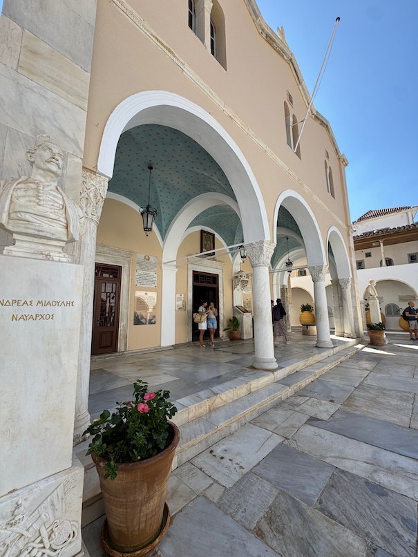 Marble cloister with arches at the Monastery of the Dormition in Hydra town