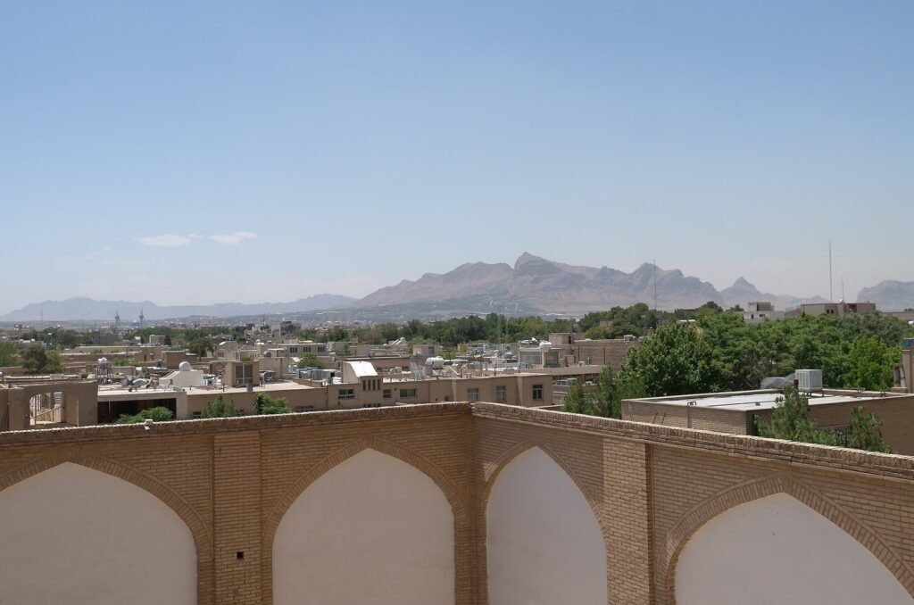 View over Isfahan city with mountains, from the terrace of Ali Qapu Palace