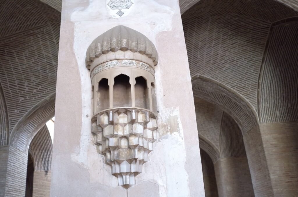 Carved stucco ornament on a pillar in the Jameh Mosque of Isfahan
