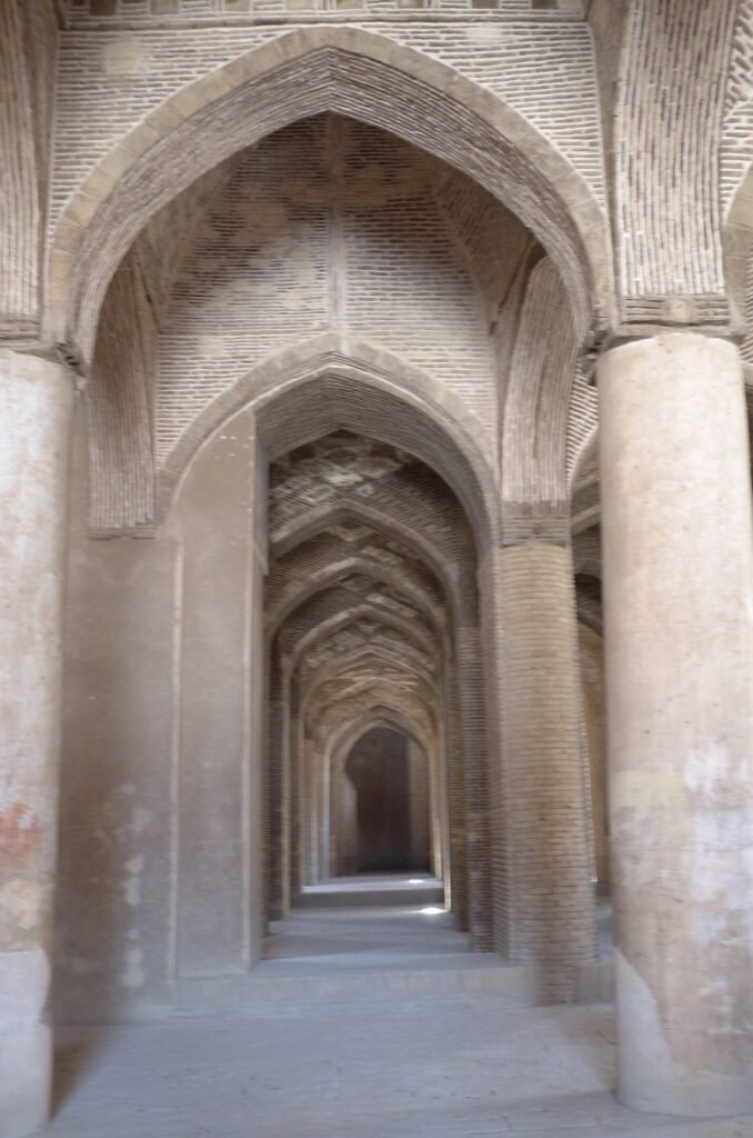 Long row of brick arches in the Jameh Mosque of Isfahan