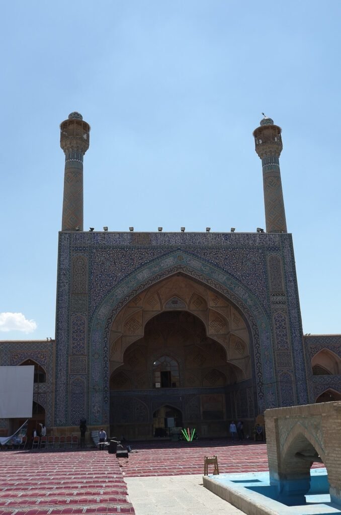 Iwan with two minarets in the courtyard of the Jameh Mosque of Isfahan