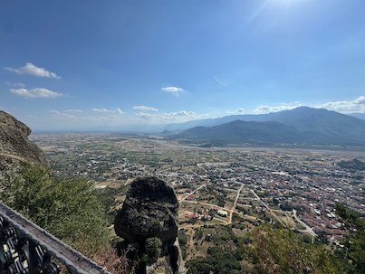 View from a railing at Meteora over Kalambaka and the plain