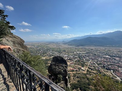 Wide view over Kalambaka town and mountains from a Meteora viewpoint