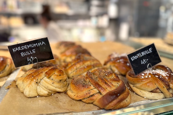 Fresh Swedish cinnamon buns, kanelbullar, on display, photographed by Zayera Khan