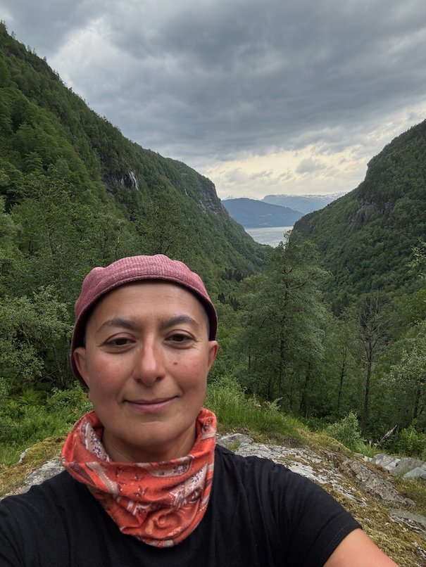 Selfie in the valley with the fjord far behind
