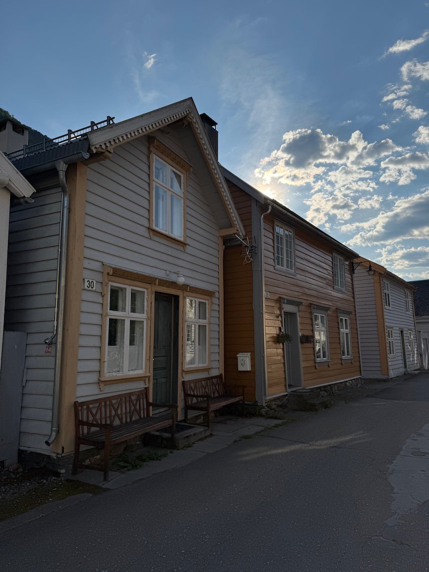 Row of old wooden houses on a quiet street in Lærdalsøyri