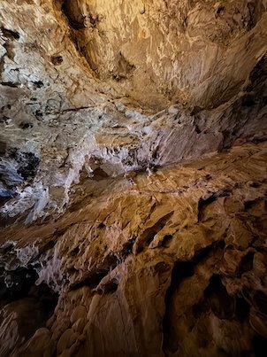 Rough rock formations cover the ceiling and walls of Vrelo Cave at Matka near Skopje.