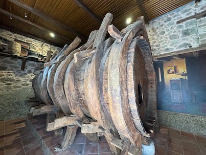 Huge old wooden wine barrel in a stone room of a Meteora monastery