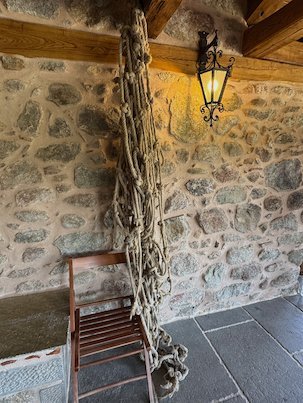 Old rope net that hangs on a stone wall in a Meteora monastery