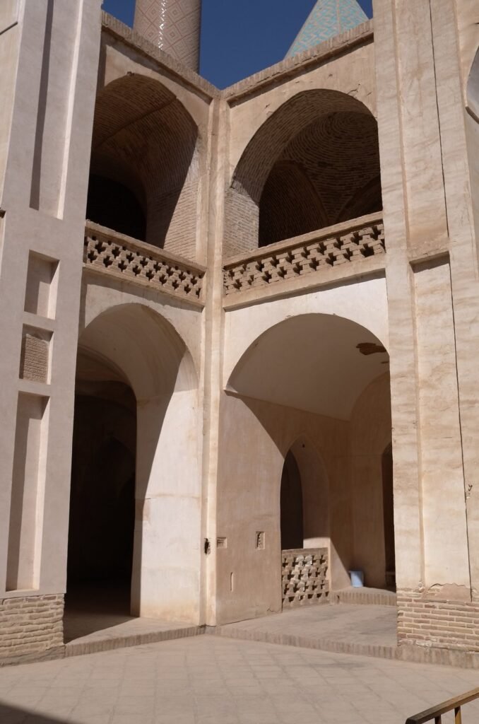 Courtyard arches and the minaret of the Jameh Mosque of Natanz