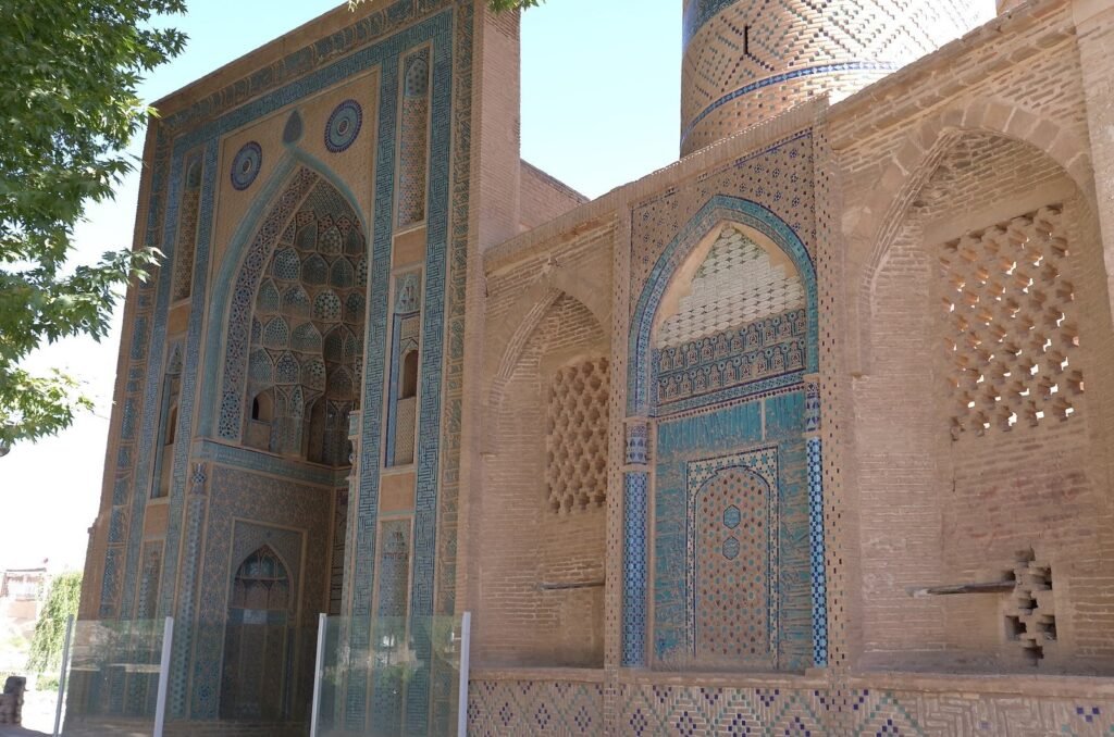 Facade with blue tiles and brick work at the Jameh Mosque of Natanz