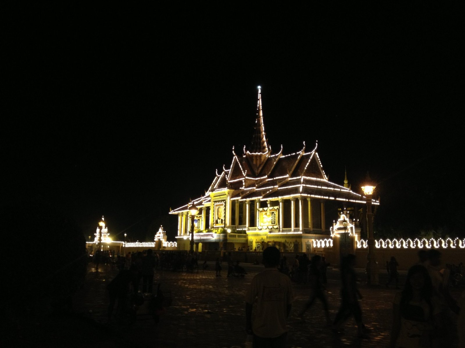 A royal pavilion with many lights shines in the dark in Phnom Penh.