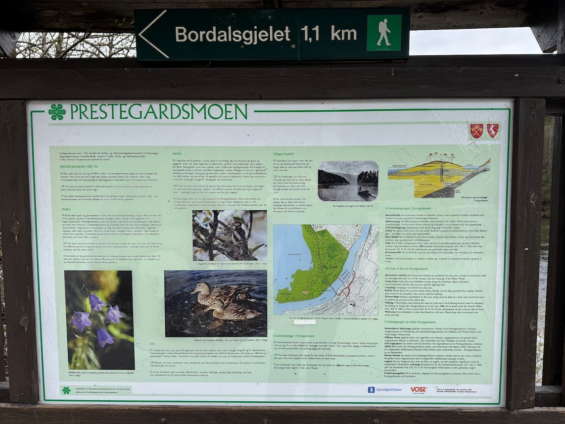 Information board Prestegardsmoen with a map and pictures of the nature reserve in Voss