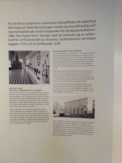 Exhibition wall text in Swedish about the water wheel and steam engine
