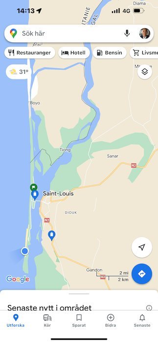 A phone map shows Saint-Louis and the Senegal River coast.