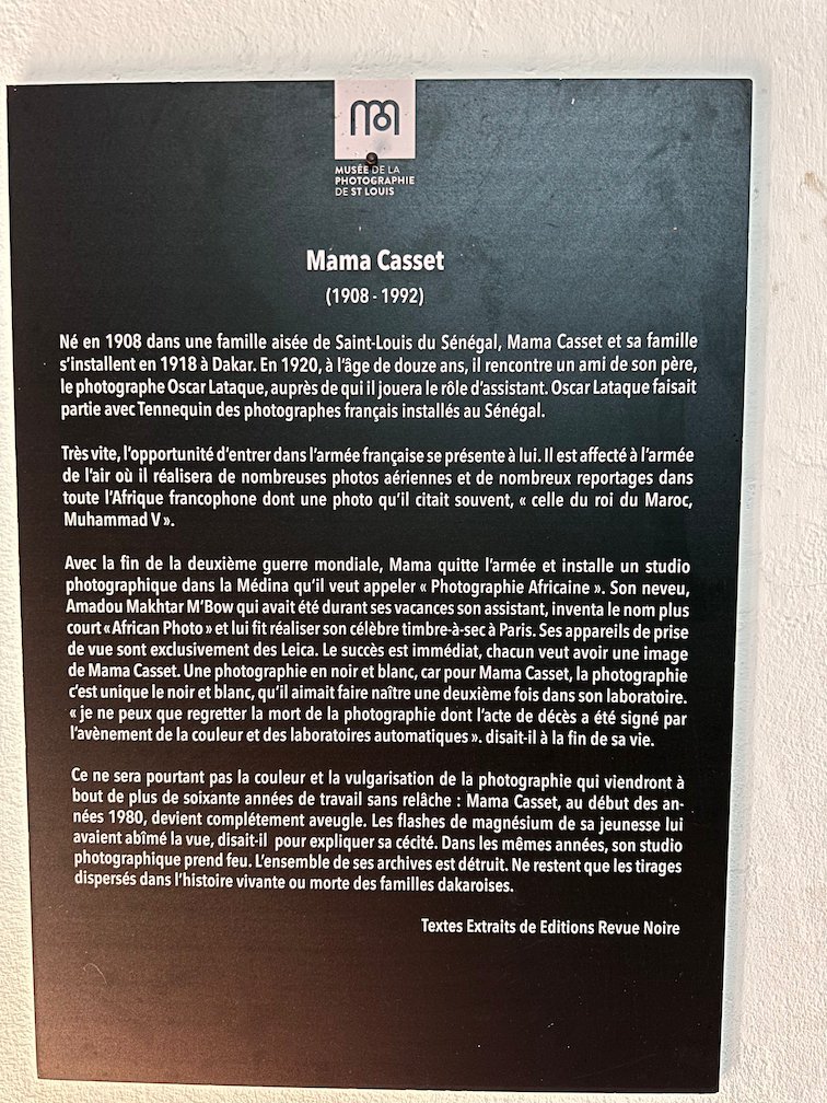 A black panel tells the life story of Mama Casset in a Saint-Louis museum.