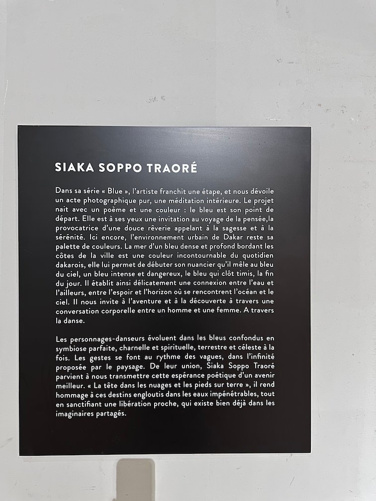 A text panel about the artist Siaka Soppo Traore hangs in a museum in Saint-Louis.