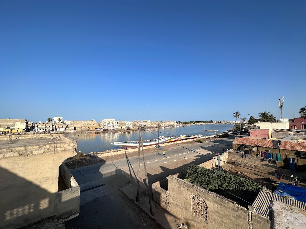A terrace looks over houses and the river in Saint-Louis.