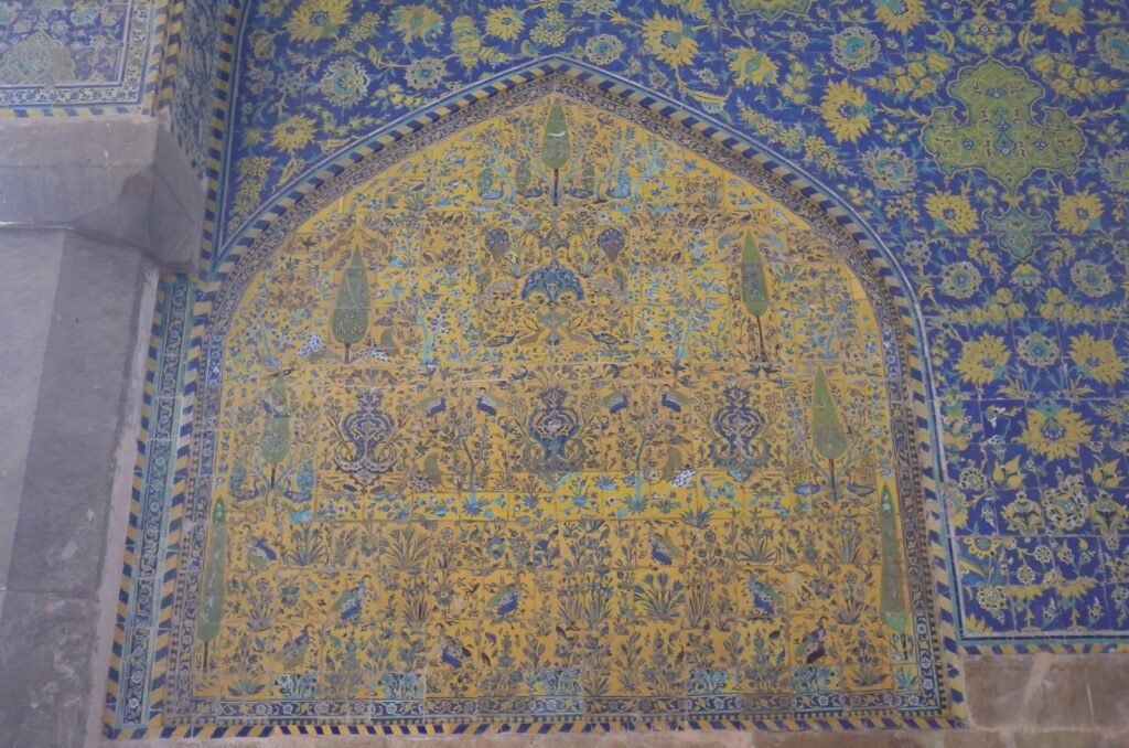 Tiled panel with flowers and a vase in the Shah Mosque