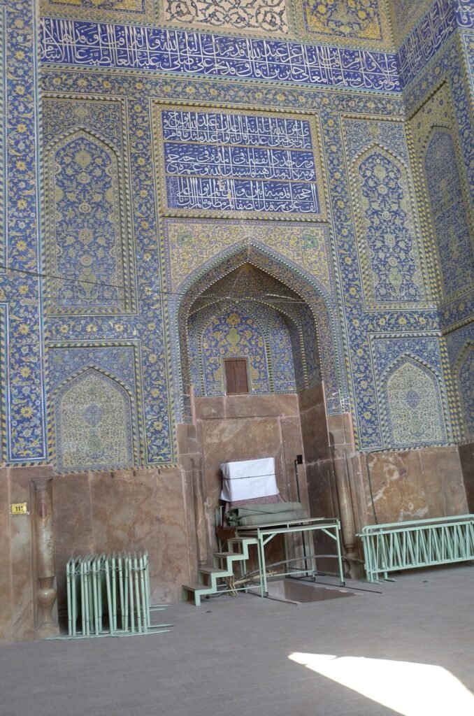 Mihrab and minbar under blue tiles in the Shah Mosque