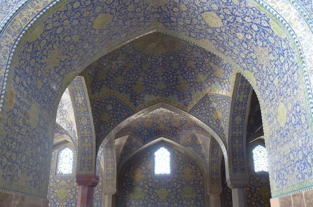 Blue tiled arches and windows in the Shah Mosque
